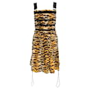 Dolce & Gabbana Gold / Schwarzes ärmelloses Kleid mit Animal-Print und Kordelzug am Saum