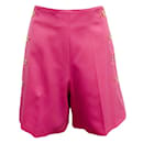 Kultige Patou-Shorts aus rosafarbener Wolle mit goldenen Knöpfen - Autre Marque