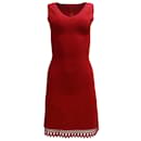 ALAÏA Vestido de cóctel de punto ajustado con cuello de pico y sin mangas con detalle de aberturas en rojo - Alaïa