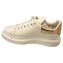 Alexander Mcqueen white and rose gold sneakers