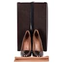 Sapatos de cunha Alaia em couro envernizado bronze - Alaïa