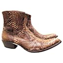 Nex-Tech boots in python leather - Autre Marque