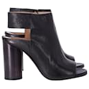 Maison Margiela Cut-out Leather Ankle Boots In Black Leather - Maison Martin Margiela