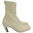 Khaite Normandy Boots in Cream Leather