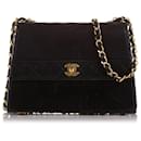 Chanel Black Timeless CC Lambskin Leather Flap Bag