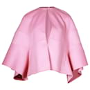 Abrigo estilo capa de lana rosa de Valentino Garavani