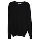 Suéter de punto con cuello en V de Yves Saint Laurent en lana negra