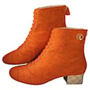 Chanel Paris-Salzburg Orange TextileQuilted Gold Heel Ankle Boots