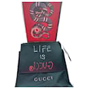 Gucci is life clutch bag