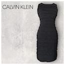 Vestido ajustado con volantes y mangas de punto gris de Calvin Klein 12 US 8 UE 40 BNWT