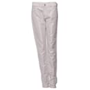Ralph Lauren, white shimmery jeans.