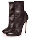 Dsquared2, black soft stretch leather ankle boots.