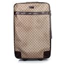 gucci, GG canvas suitcase in brown - Gucci