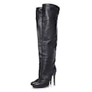 Jimmy Choo, Black leather over knee boots.