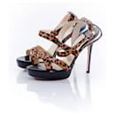 Jimmy Choo, black sandal with crossover straps in leopard print