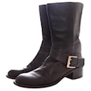 Chloe, black leather biker boots with buckle. - Chloé