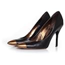 YVES SAINT LAURENT, Zapatos de tacón de cuero negros - Yves Saint Laurent