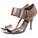 gucci, bronze colored sandals in size 39. - Gucci
