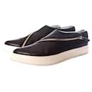 JIL SANDER, black leather sneakers with pointed toe and golden zipper in size 40. - Jil Sander
