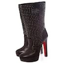 CHRISTIAN LOUBOUTIN, Black leather platform boots with silver studs in size 40. - Christian Louboutin