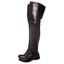 Prada, long black leather boots.