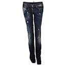 Dsquared2, dark blue ripped jeans with white paint spots in size 40IT/XS.