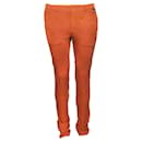 Kenzo, naranja/pantalones color óxido en talla IT44/XS.