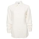 MOSCHINO COUTURE, Vintage Cream-colored blouse. - Moschino