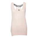 Patrizia Pepe, top with metal beads on the back.