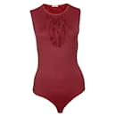 WOLFORD, body con stringhe laser rosse con frange nella taglia M. - Wolford