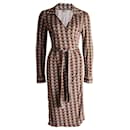 Omnia, wrap dress in brown/beige with graphical print in size UK10/S. - Autre Marque
