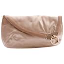 Jimmy Choo, beige satin clutch with brown suede border and golden hardware.