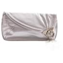 Jimmy Choo, silver leather clutch with fringes.