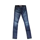 J Brand, middle blue low rise pencil leg jeans in size 25.