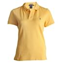Ralph Lauren. Camisa pólo amarela em tamanho L.