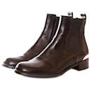 Russell & Bromley, black leather chelsea boots. - Autre Marque