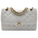 Chanel Chanel Timeless Classic Paris Limited bag in white leather lined flap