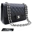 Chanel 11" Large Grained calf leather lined Flap Chain Shoulder Bag