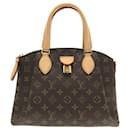 Louis Vuitton Rivoli PM handbag Cloth ref.767319 - Joli Closet