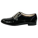 Chaussures plates vernies noires à lacets blancs - taille EU 37.5 - Christian Louboutin