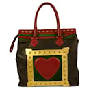 MOSCHINO Redwall 1990s „Art is Love“ Vintage mehrfarbige Handtasche mit Herznieten - Moschino