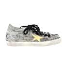 Golden Goose Super Star Distressed Glittered Leopard-print Trainers in Silver Leather