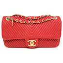 Chanel Classque Timeless red chevron bag