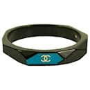 CHANEL CC Logo Bangle Bracelet In Black Resin with teal background Geometric cuff - Chanel