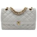 Chanel Timeless Classic Paris Limited bag in white leather lined flap