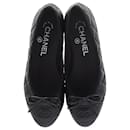 Chanel CC Cap Toe Bow Quilted Ballet Flats in Black Leather