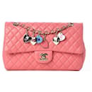 Chanel pink coral medium timeless classic limited edition quilted lambskin leather valentines heart charms flap bag with light Champaign gold hardware