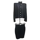 Chanel Vintage black skirt suit with golden chain