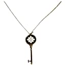 TIFFANY & CO. Gänseblümchen-Schlüsselanhänger-Halskette aus Diamant- und Goldmetall - Tiffany & Co