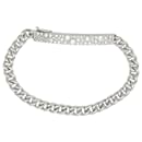 Bracelet Dior, "Gourmette", or blanc, diamants.